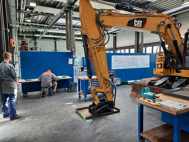 Une impression du 2e examen professionnel pour les mécaniciennes/mécaniciens en machines agricoles, en machines de chantier et d’appareils à moteur.